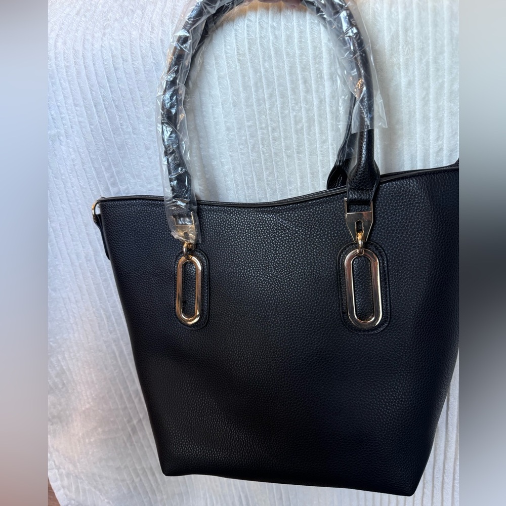 Elegant Black Tote with Textured Design and Gold Details